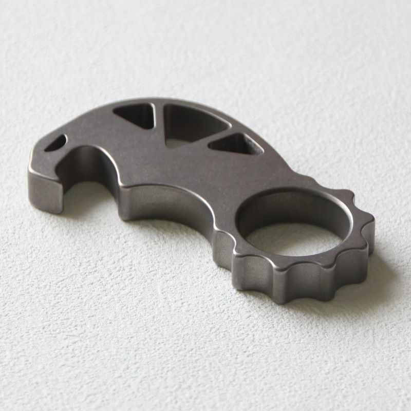 Titanium Monster Bottle Opener Multi-Function Keychain Knuckle Dusters