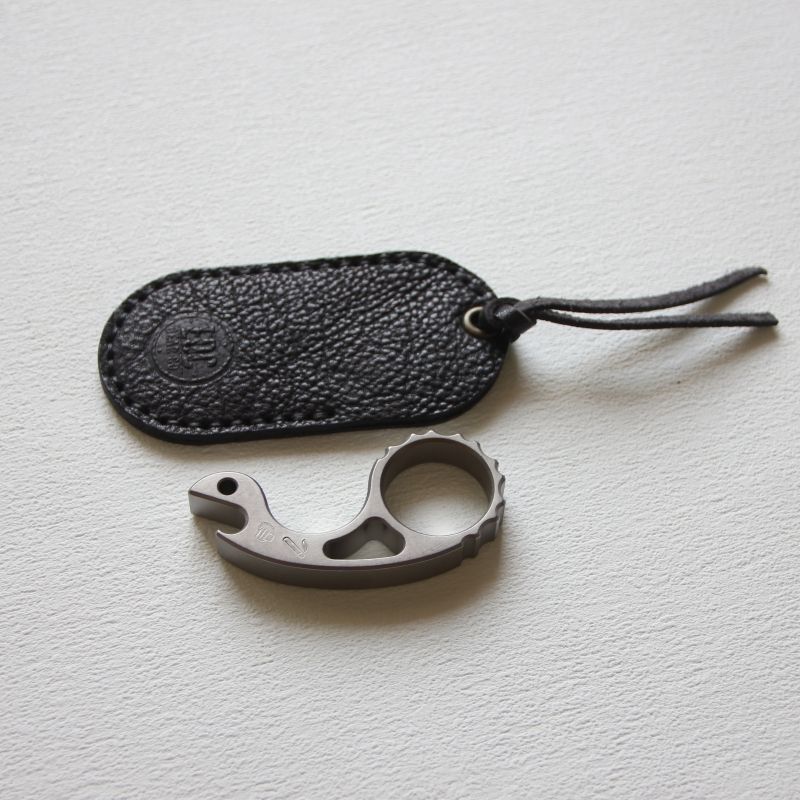 Titanium Alloy Snail Multi-function Bottle Opener Keychain Backpack EDC Knuckle Dusters