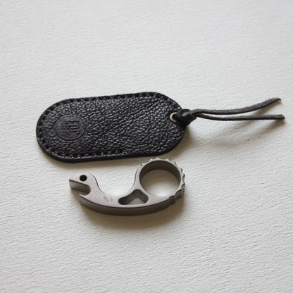 Titanium Alloy Snail Multi-function Bottle Opener Keychain Backpack EDC Knuckle Dusters