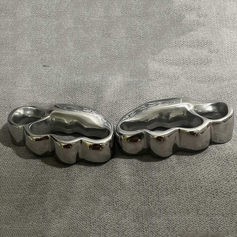 Creative Personalized Left Knuckle Dusters and Right Hand Irregular Hole Outdoor Polishing Tool